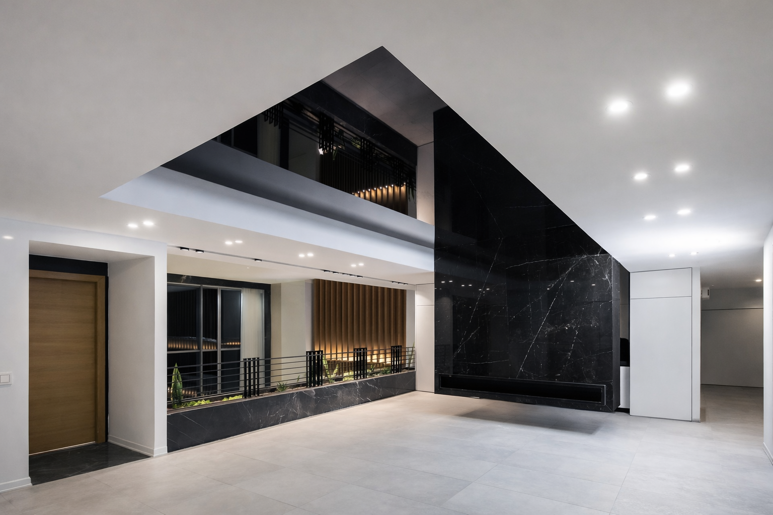Double-height luxury residential living space featuring a dramatic black stone feature wall and modern architectural detailing by ReArt.