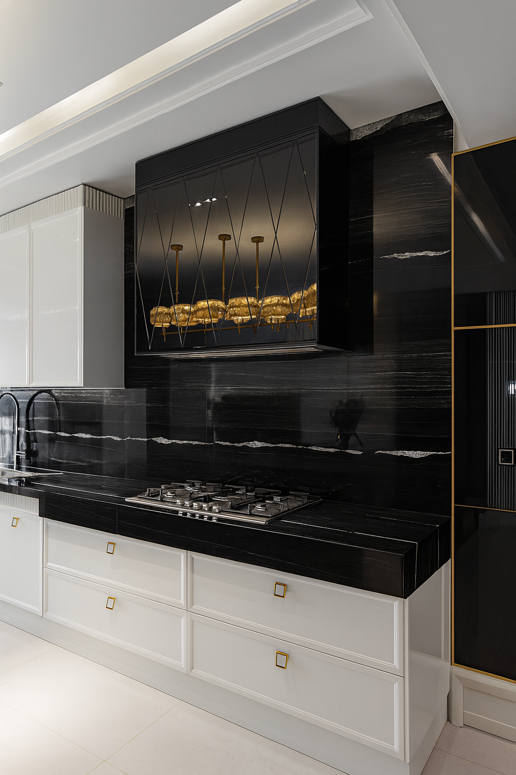 Luxury kitchen design featuring a black stone feature wall with integrated hood, white custom cabinetry, and refined gold accents in a house