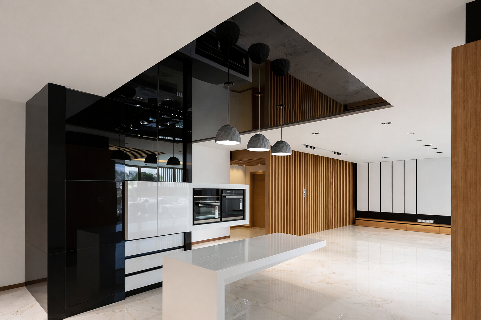 Open-concept luxury kitchen and living space featuring black stone surfaces, custom millwork, and modern lighting designed by ReArt.