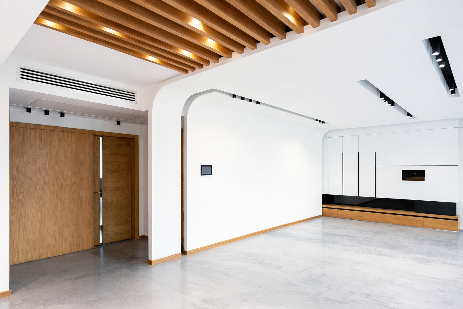 Luxury residential interior featuring curved architectural archways, wood ceiling accents, and a modern space designed by ReArt.