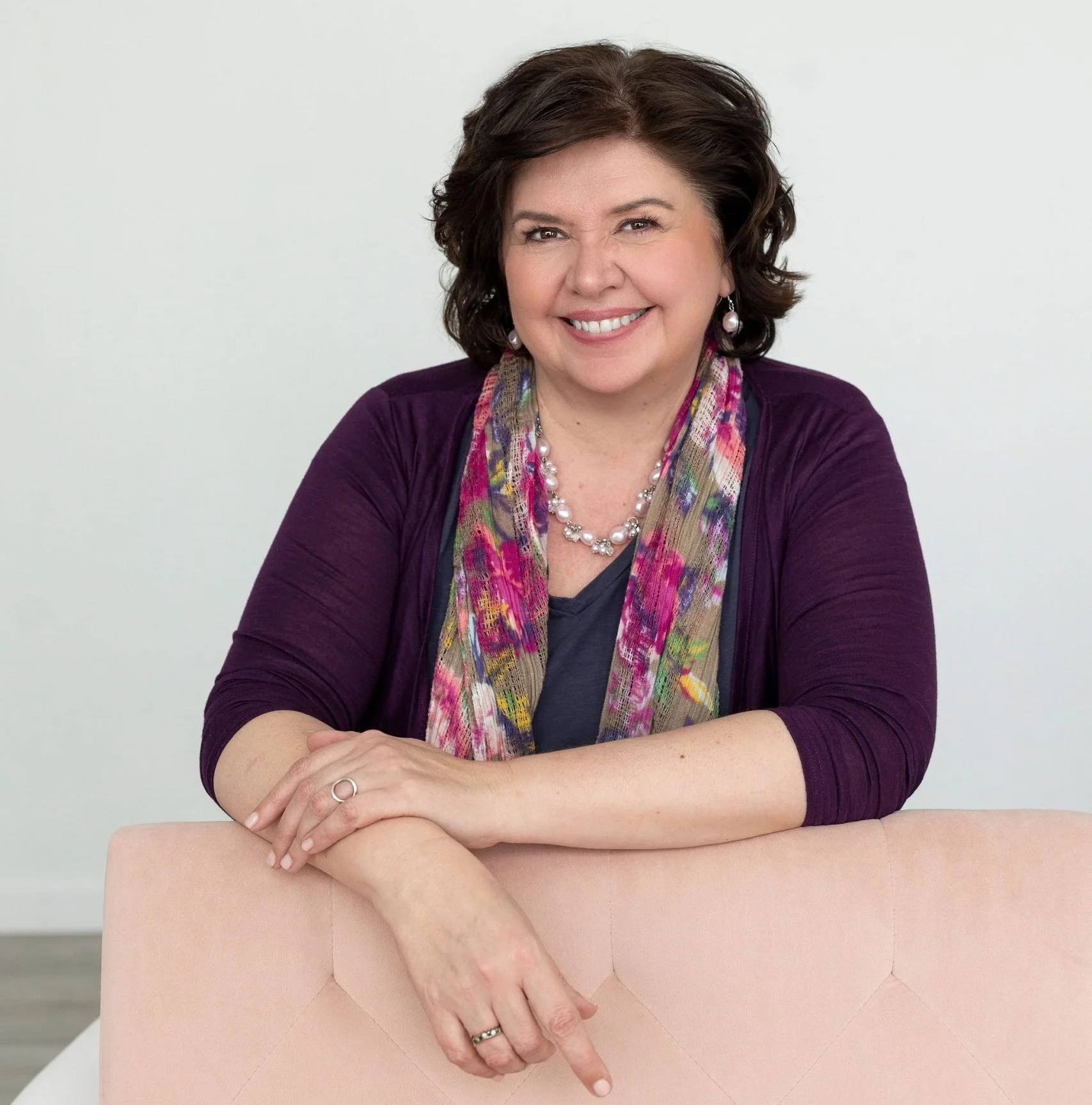 Judi Harrington, client of Simplify Simplify, smiling headshot