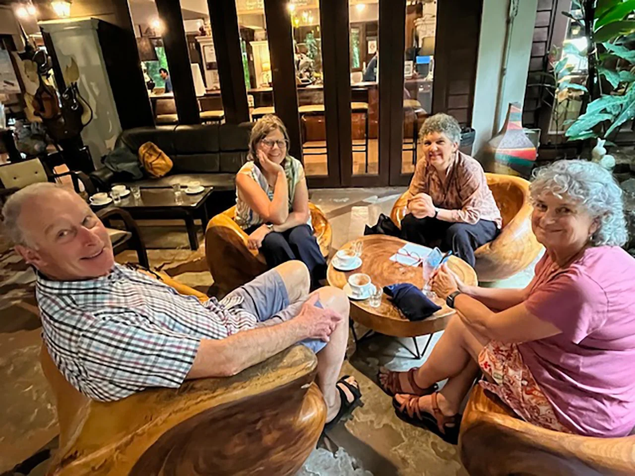 Four people enjoying a cuppa