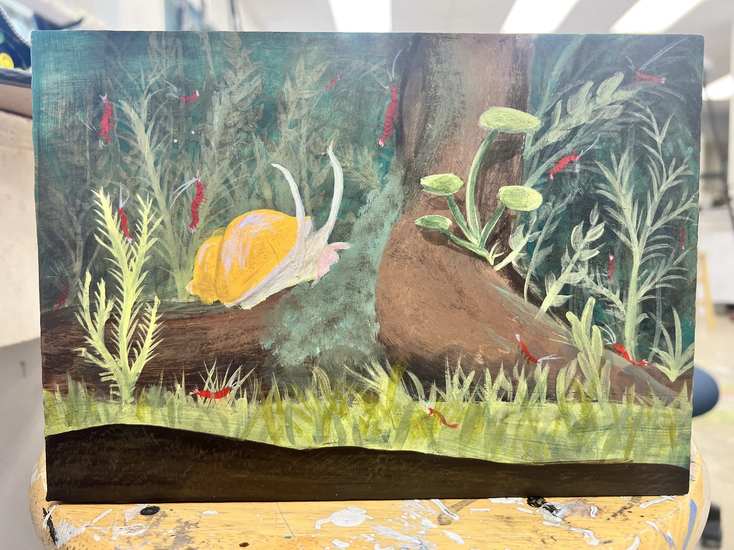 A painted scene of a pond floor with a large yellow mystery snail surrounded by various sizes of red shrimp.