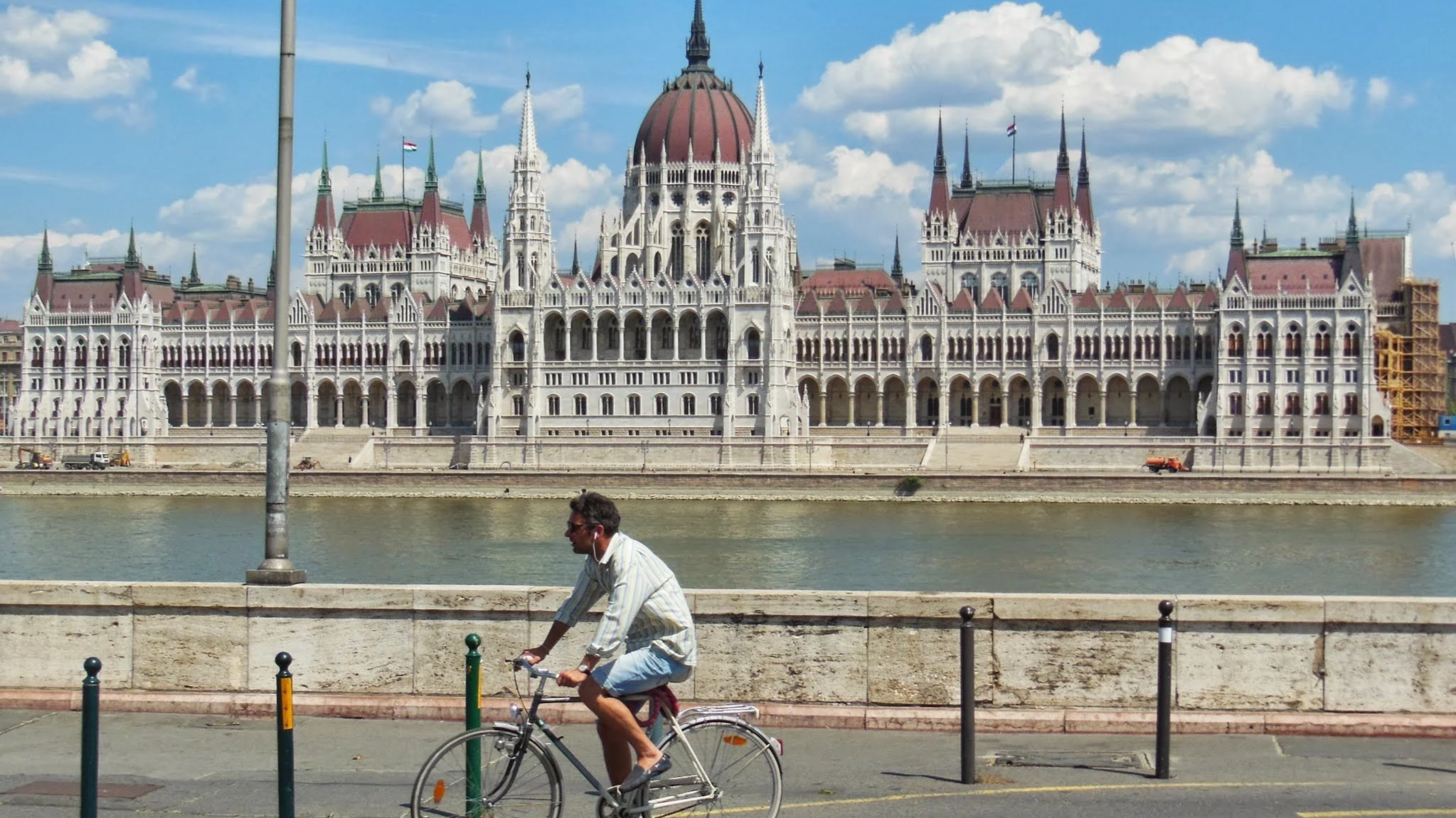 Laurie’s customers, Larissa and Emmett, just married walking off the aisle together.