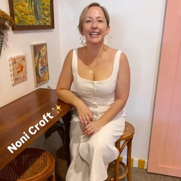 Noni&rsquo;s pretty sure Bluey holds the answers to most of life&rsquo;s problems, and honestly, she&rsquo;s not wrong. 

A holistic trauma therapist, queer parent, and the brains behind this whole thing, Noni is equal parts wisdom and curiosity.

Th