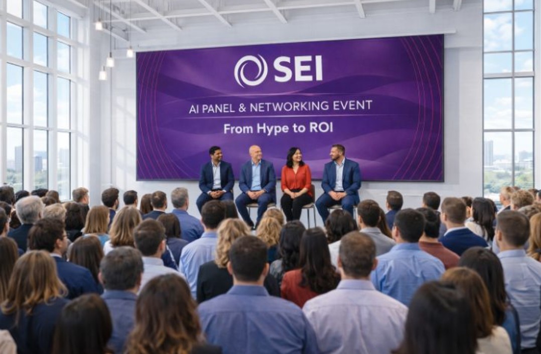 Crowd watching four panelists on stage beneath a large purple screen reading “SEI – AI Panel & Networking Event: From Hype to ROI"