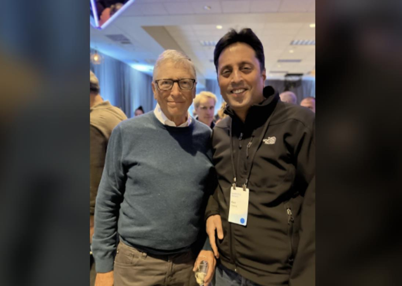 Photo of Ravi Vedula with Bill Gates 