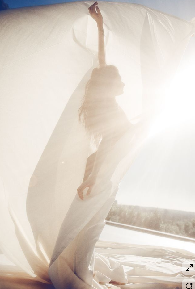 Woman wearing comfortable adaptive clothing for cancer treatment.