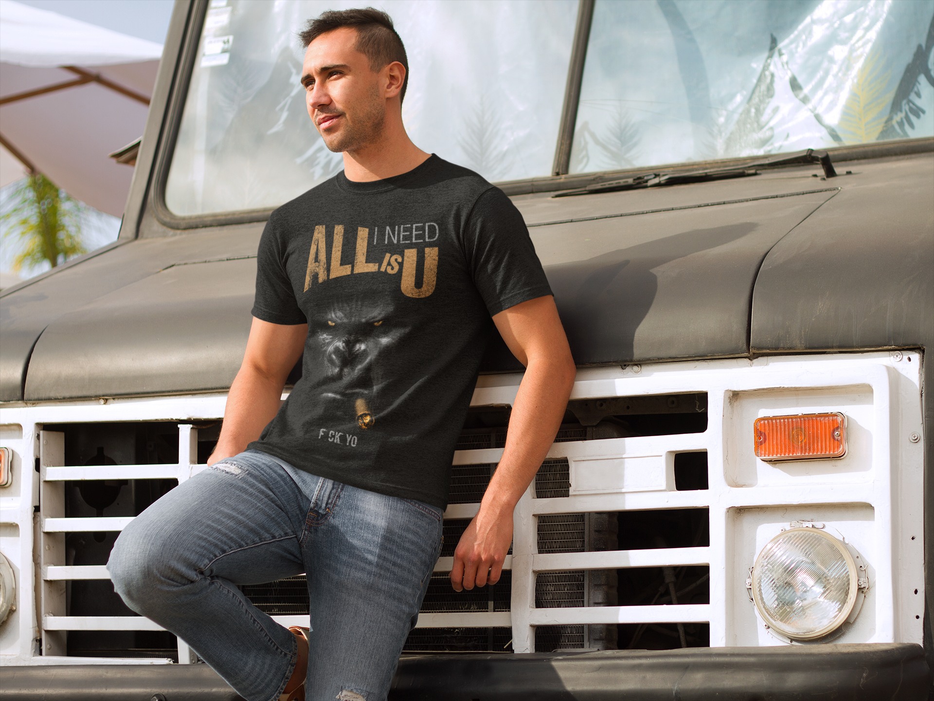 t-shirt-mockup-of-a-young-man-leaning-on-an-old-truck-a8680.png