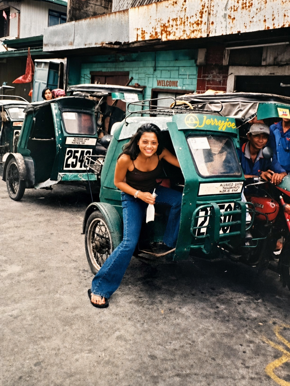 Personal photograph beside a tricycle in the Philippiens.