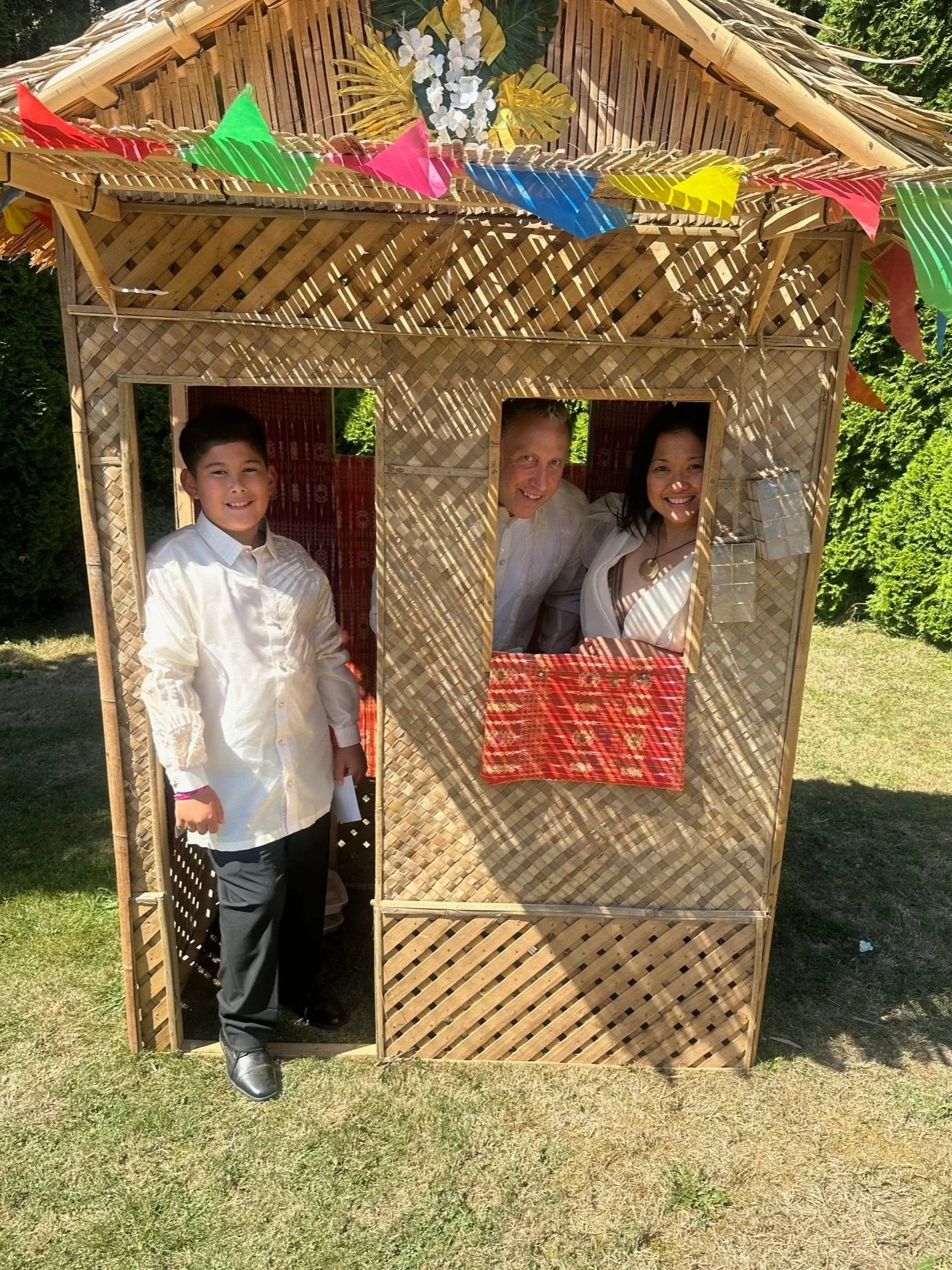 Filipino American family together at a filipino wedding