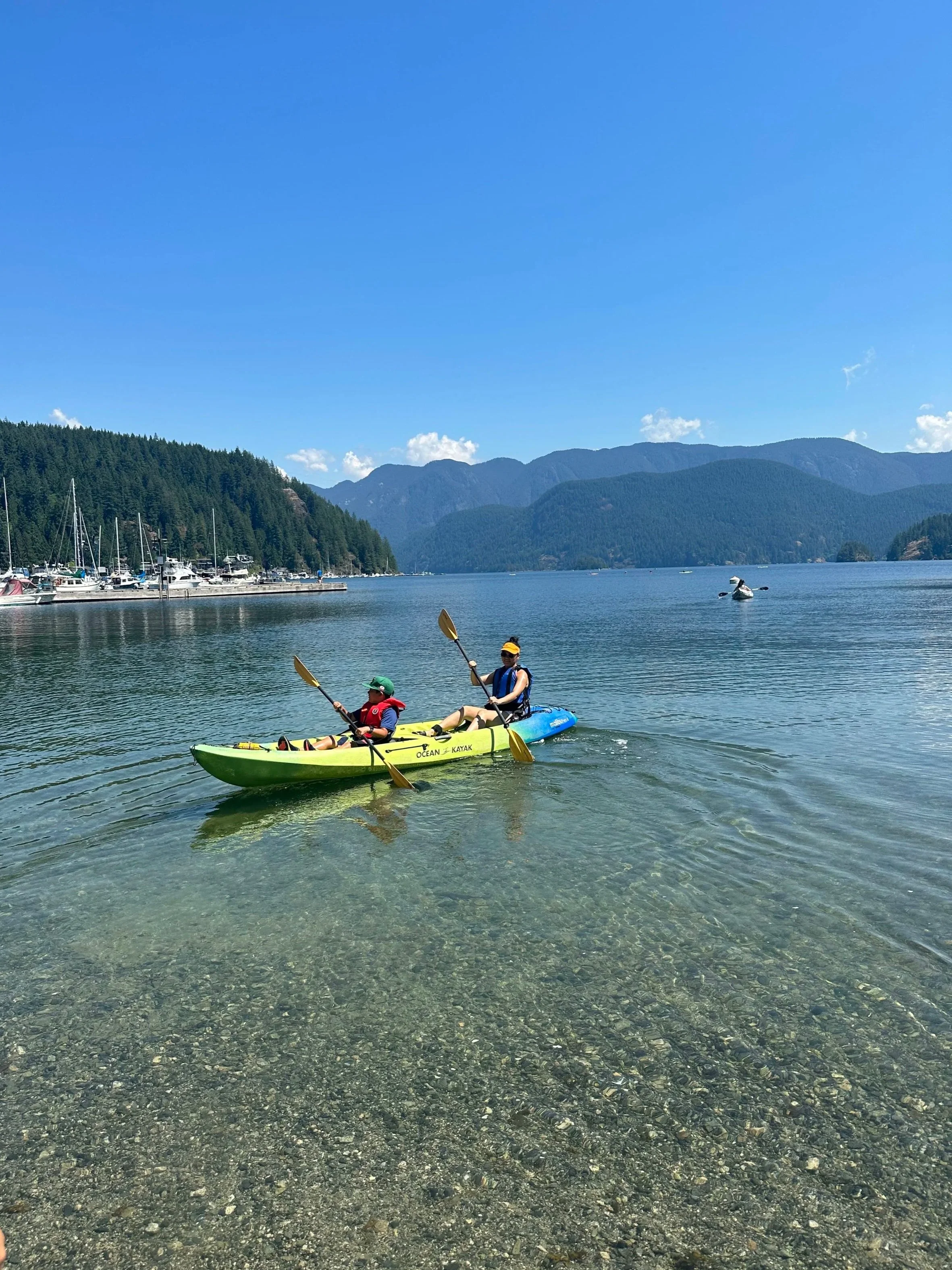 Parent and Child Kayaking on the Lake in Vancouver, Canada
