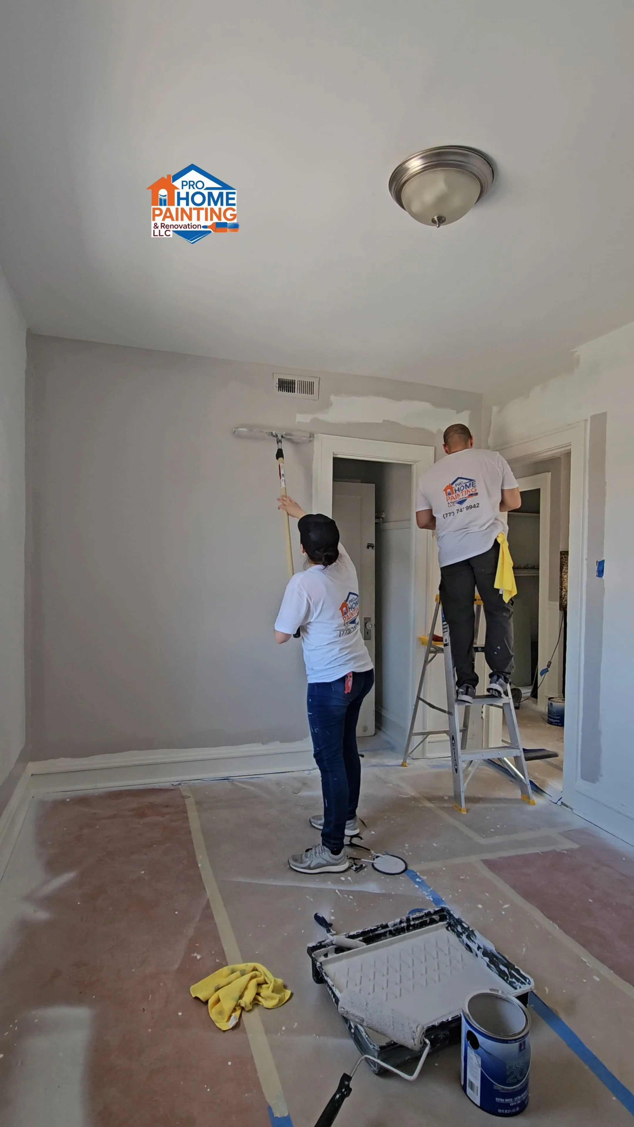 Professional interior painters painting living room walls in Chicago