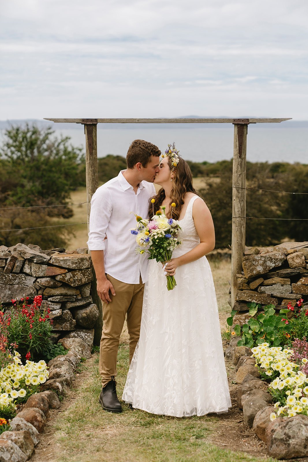 Hobart couple of their wedding day being photographed by Hobart wedding photographer