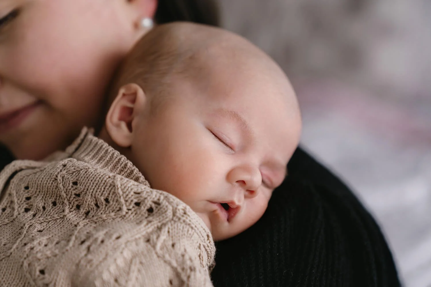 Close up photo of newborn baby's face at Hobart in home photoshoot