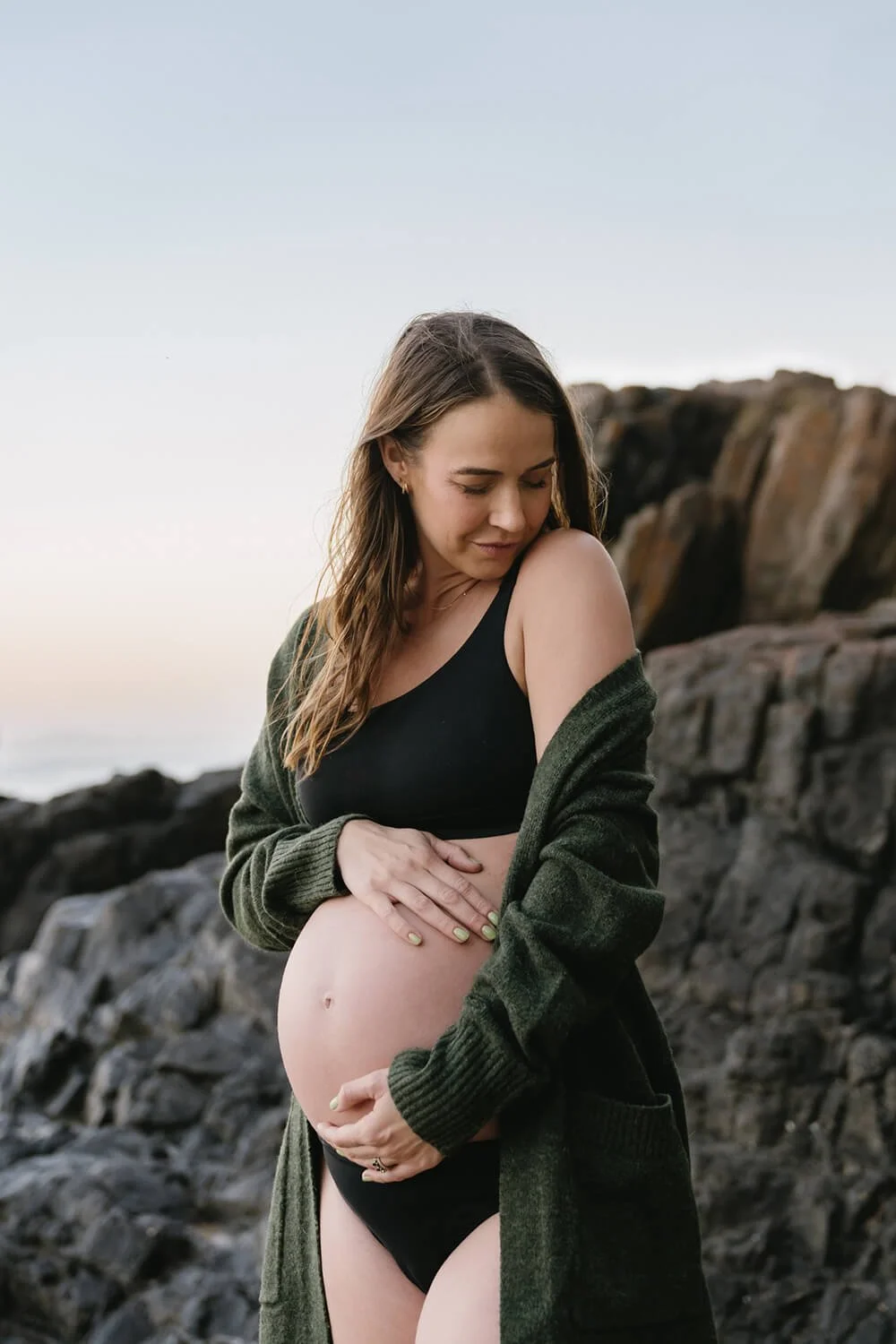 Hobart pregnant woman being photographed by maternity photographer in Hobart