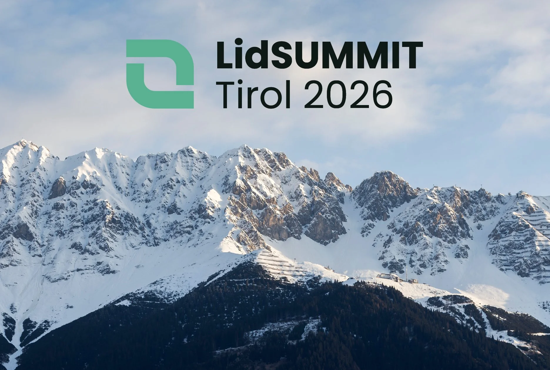 Snow-covered mountain range with the text 'LidSUMMIT Tirol 2026' and a logo in the top left corner.