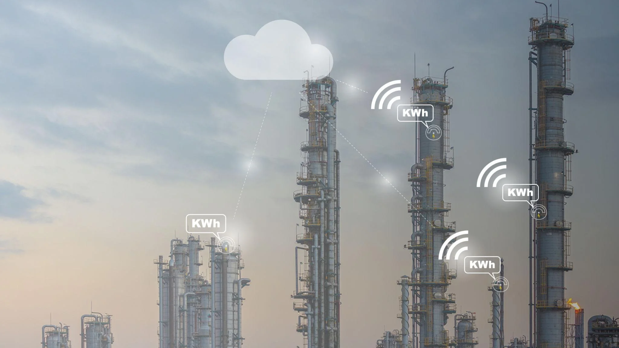 Industrial refinery with multiple tall metal towers, overlaid with digital icons representing wireless communication and kilowatt-hour (kWh) measurements, indicating data transfer and energy consumption.