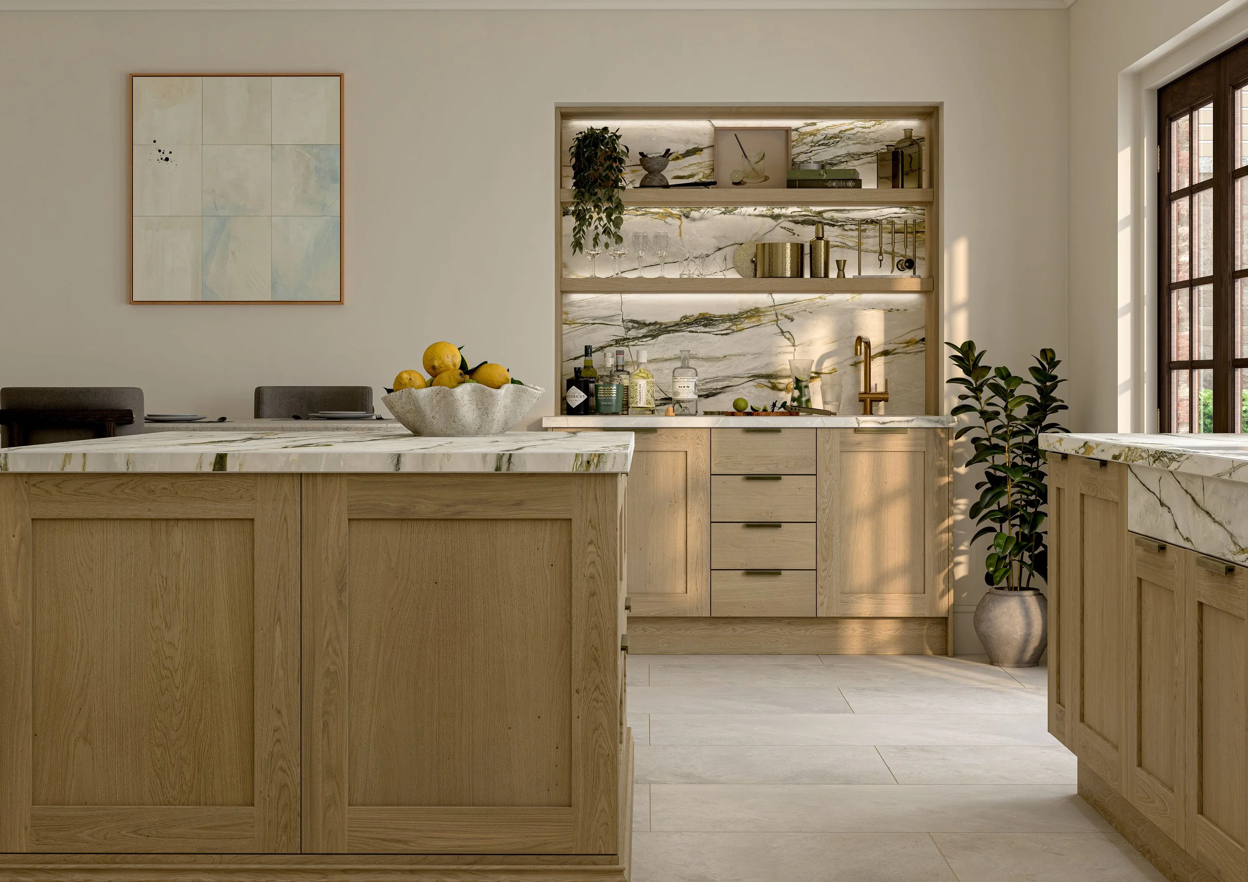 A modern kitchen with light wood cabinetry, marble countertops, and a marble backsplash. There is a bowl of lemons on the island, a potted plant next to the window, and open shelves with decor and kitchen items. A window on the right allows natural light to enter.