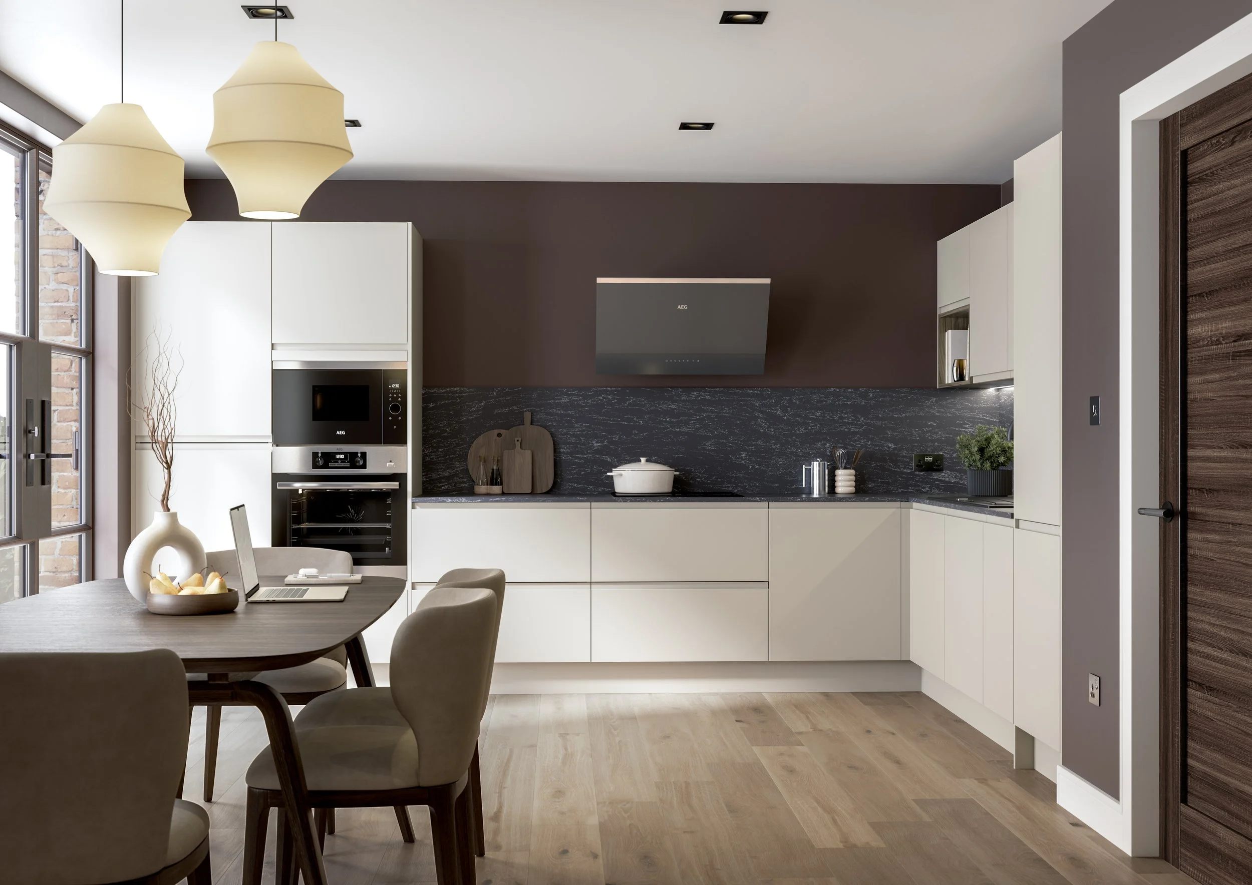 Modern kitchen with white cabinets, a black marble backsplash, a wooden dining table with beige chairs, pendant lights, and various kitchen appliances and decor.
