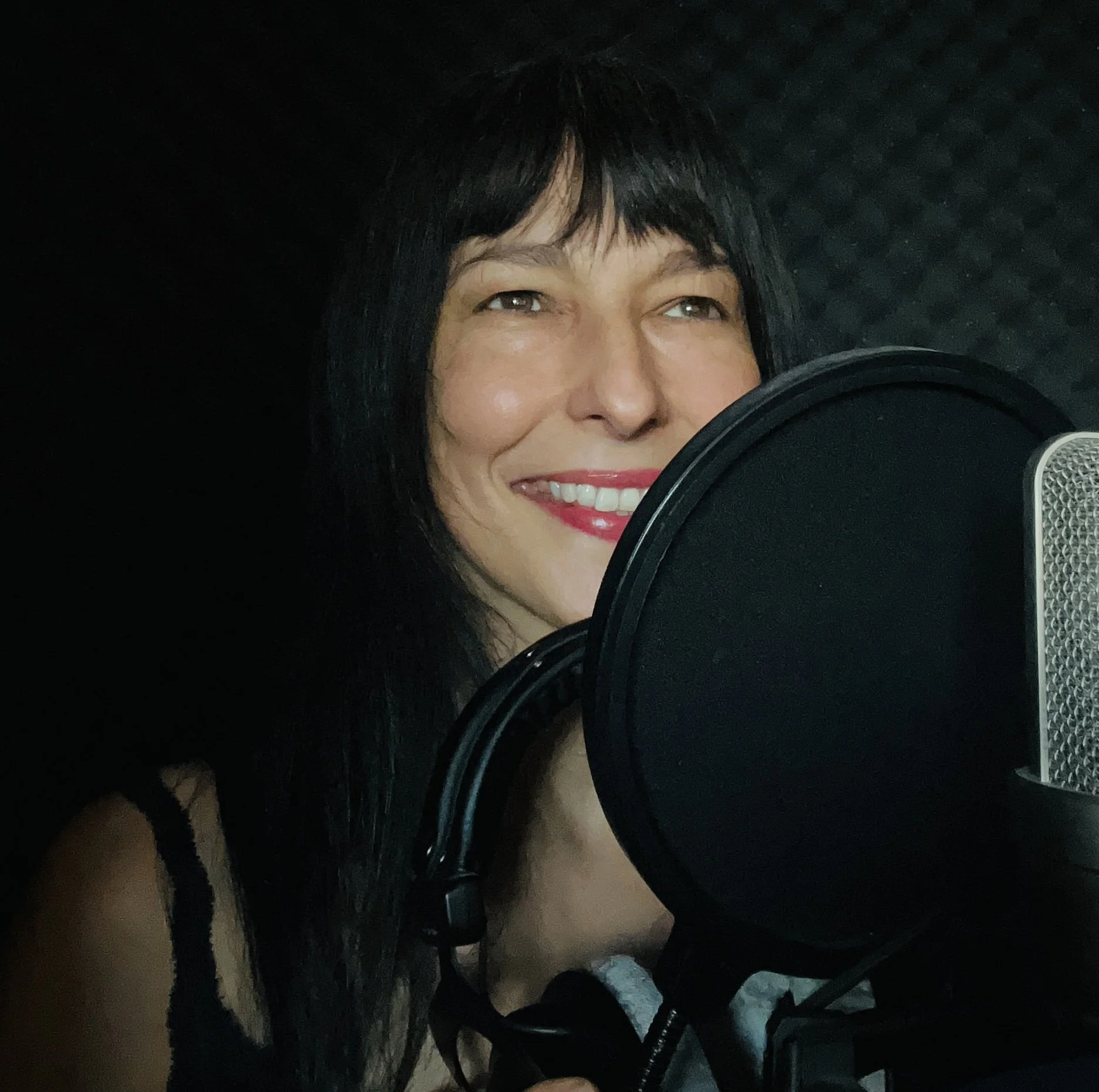 Vicky Watt, a Scottish female voice over artist in her home studio