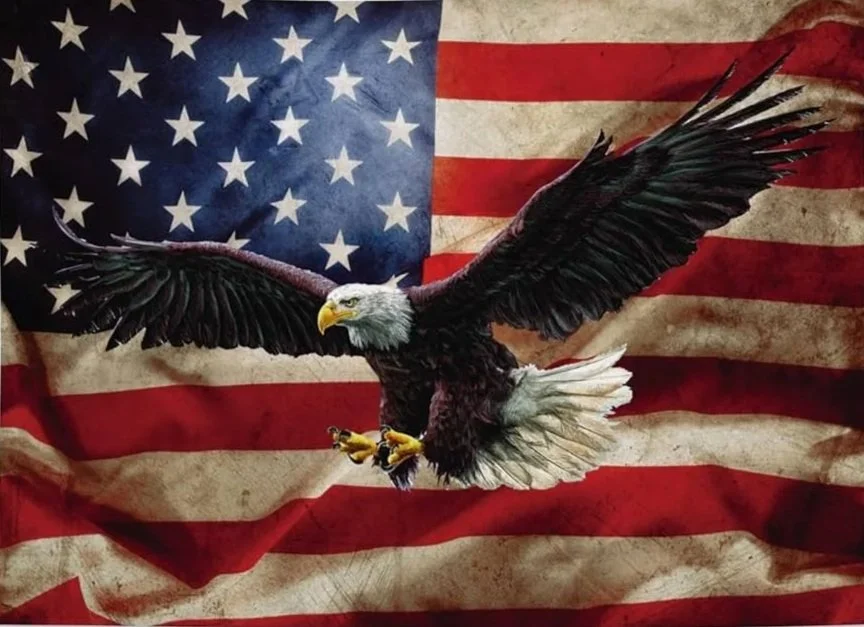A realistic eagle, symbolizing patriotism, flying in front of a worn American flag.