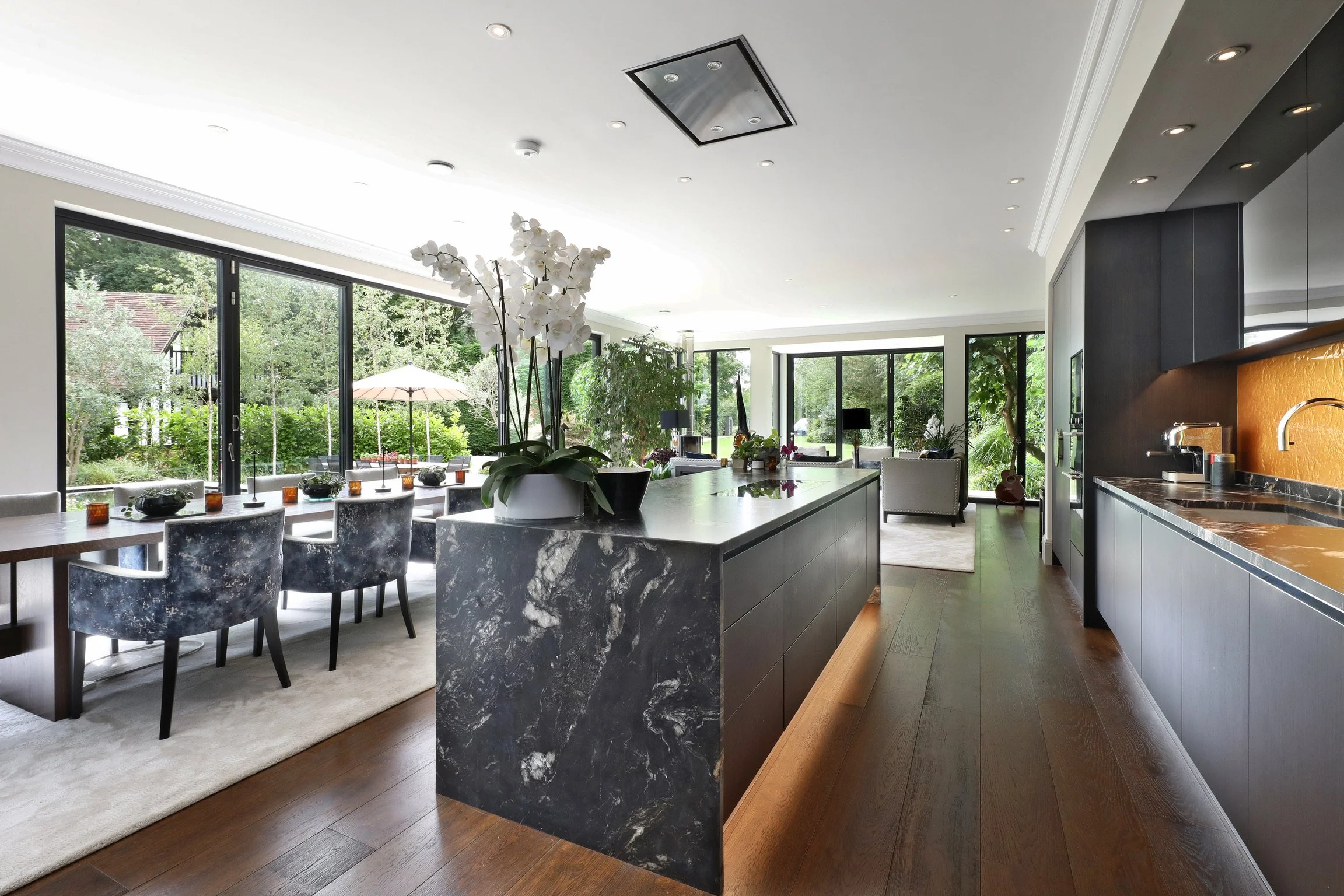 The whole kitchen with seating at the end