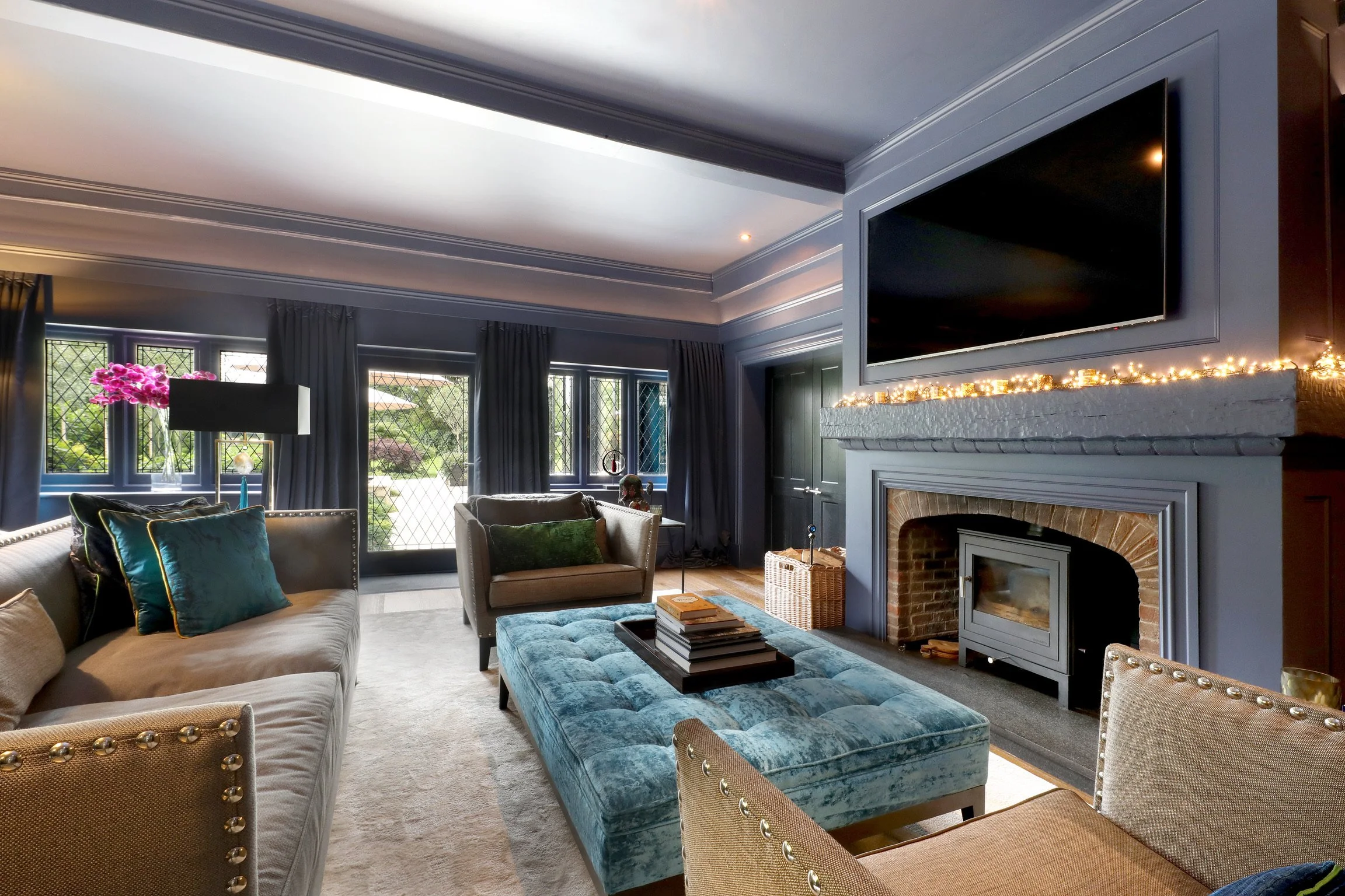 The living room with fire and tv (west facing)