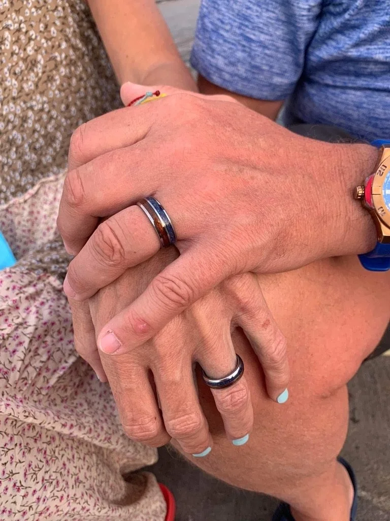 Marc and Kathryn renew their vow - holding hands - Hawaii