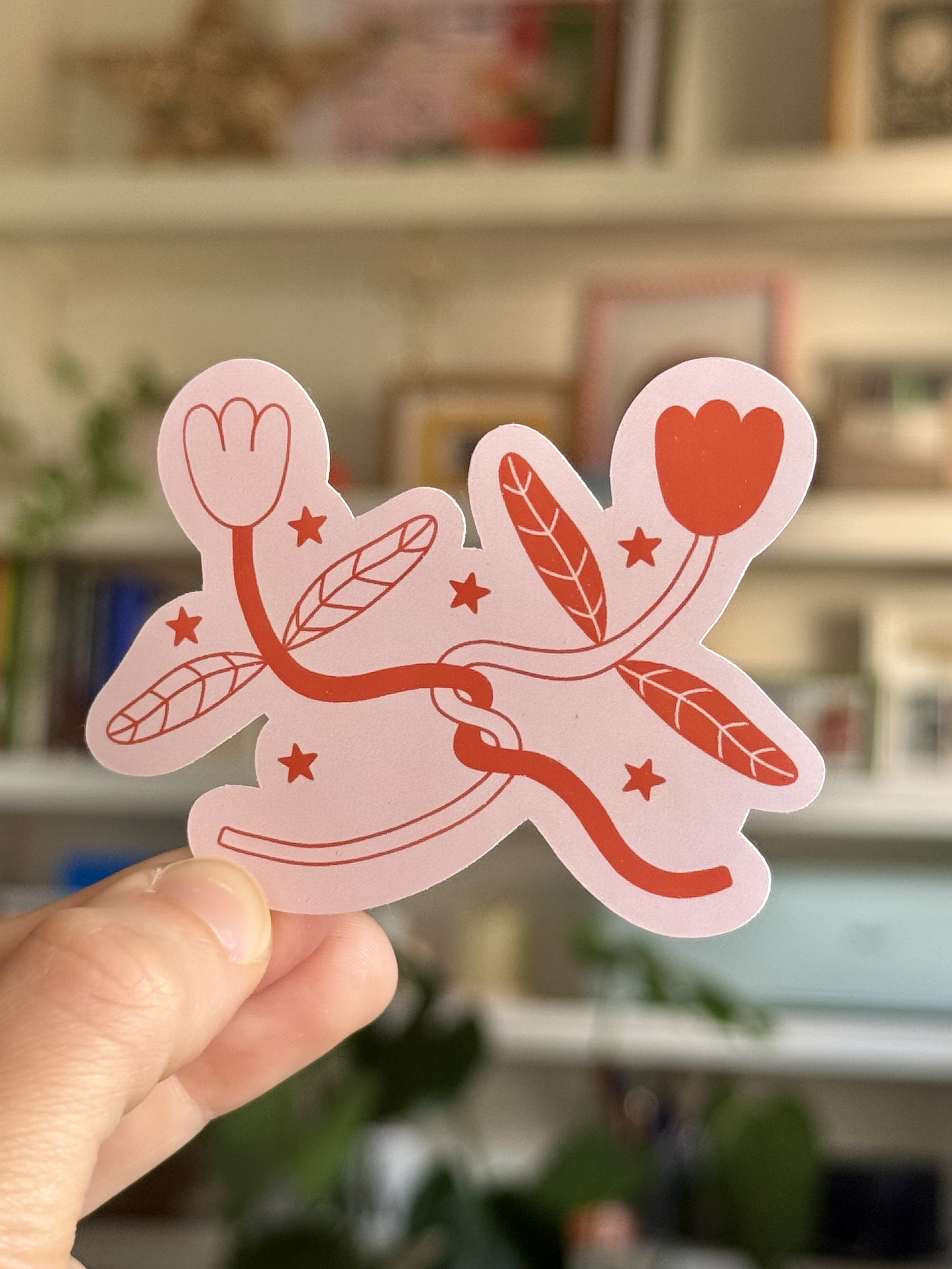 intertwined flowers sticker 2.png
