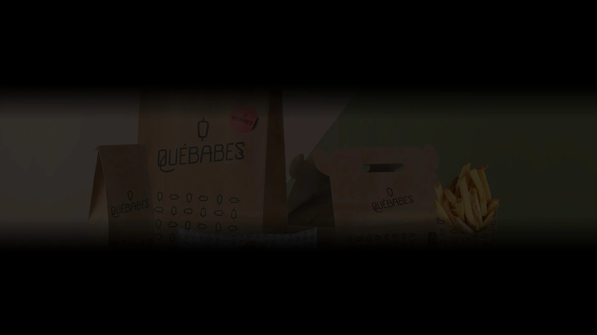 Paper bags with the "Quebabes" logo and packaging, including a box of fries, displayed against a green background.