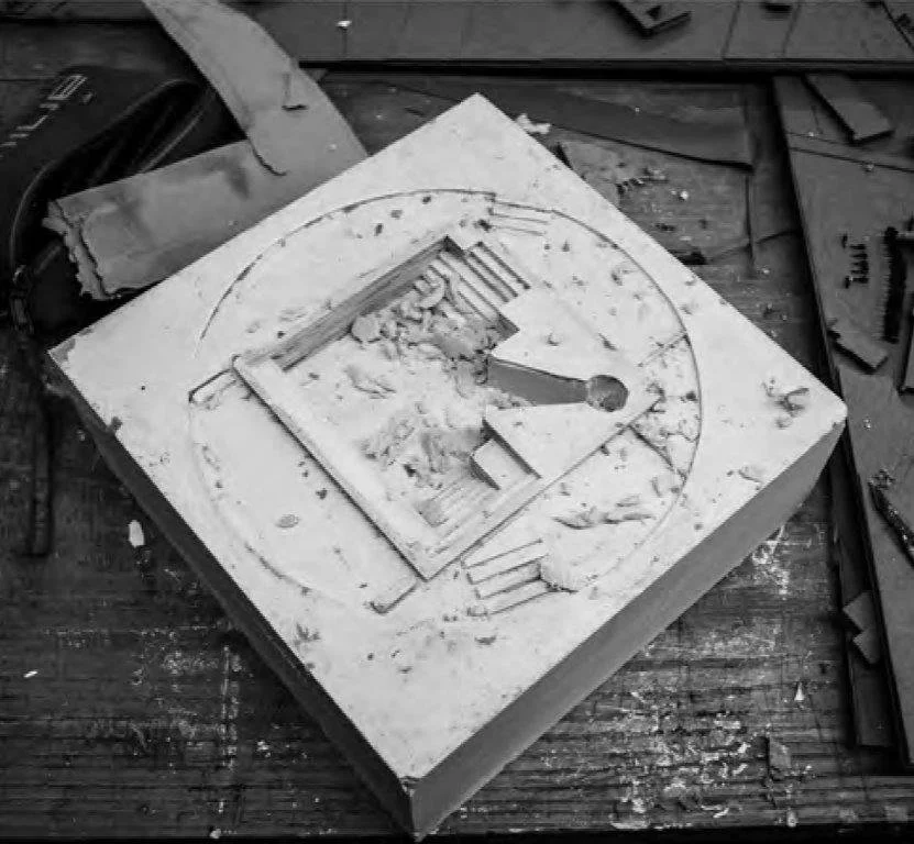 Top-down view of the mould being removed form a small architectural plaster model for a design installation for Mount Jerome Cemetery, Harold's Cross, Dublin