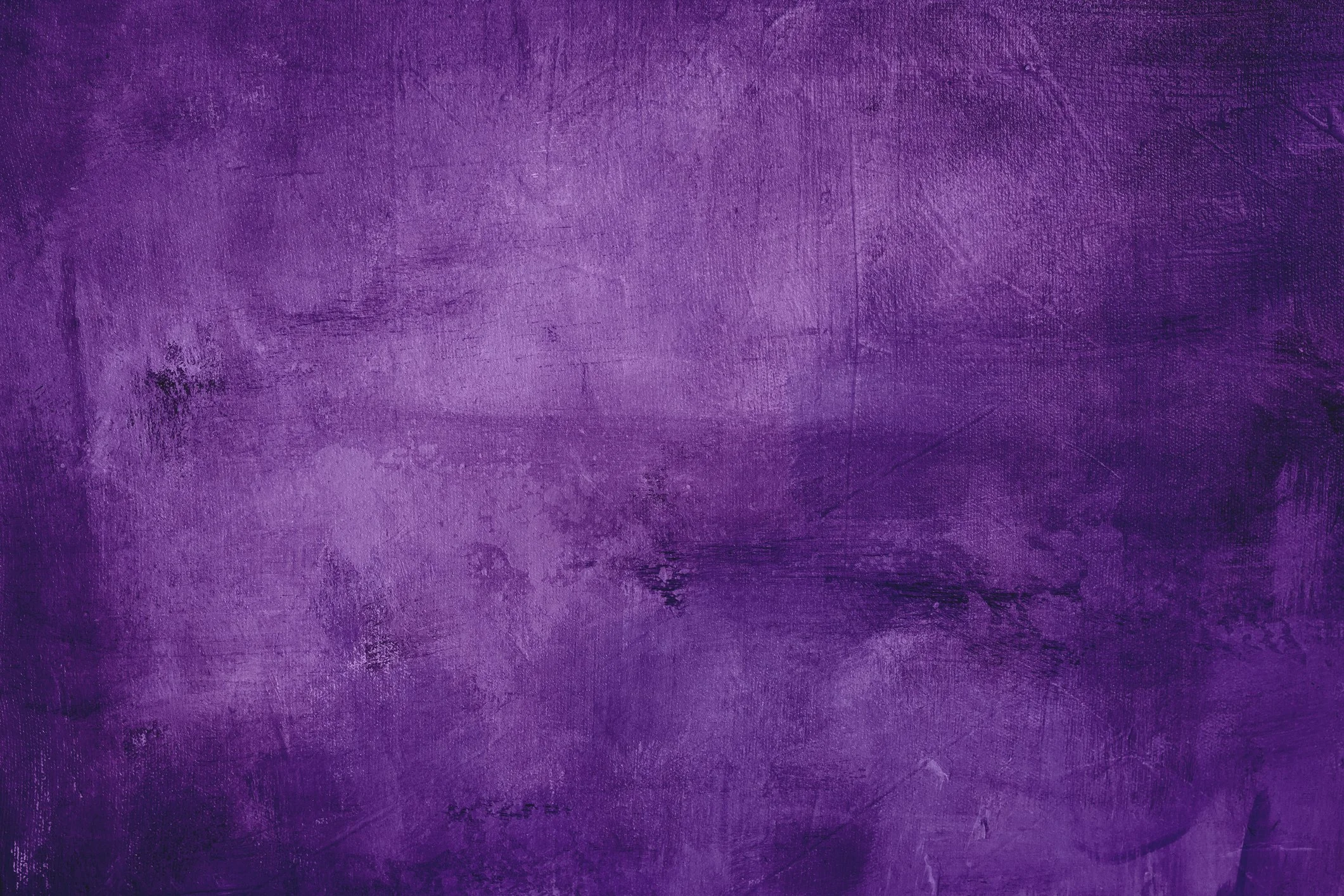 A textured purple wall or canvas with various shades of purple and some darker and lighter areas.