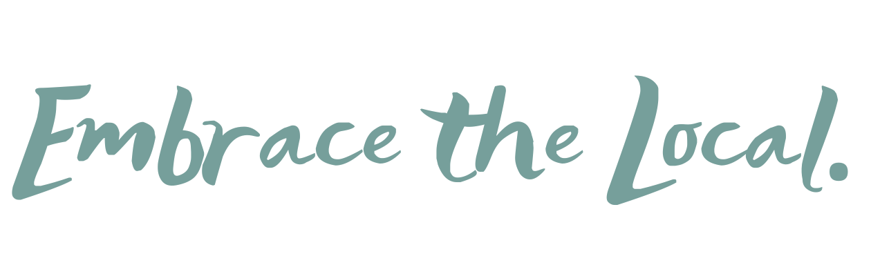 Text saying 'Embrace the Local.' in cursive font with a black background.