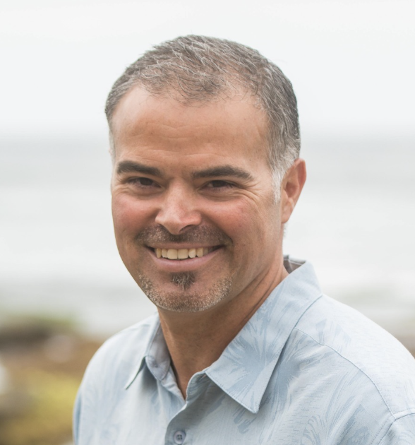 Black silhouette of a man's profile with short hair against a white background.