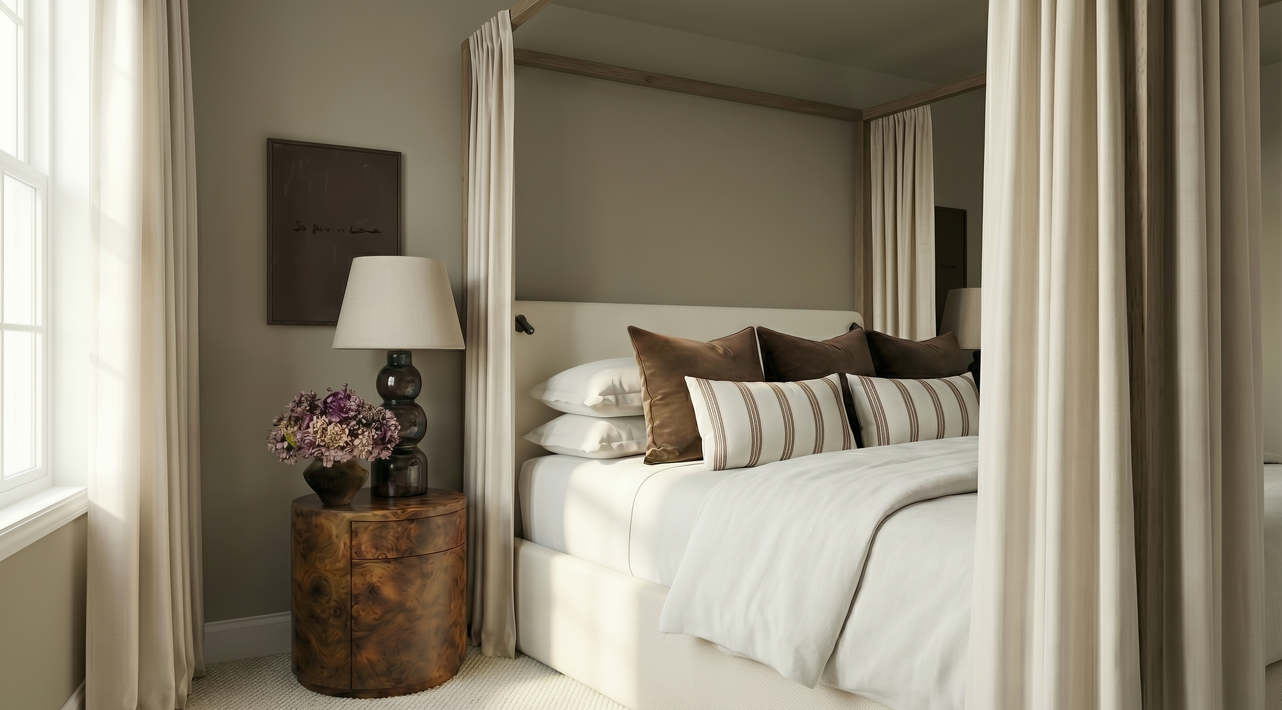 Serene master bedroom in North Yorkshire featuring a light oak four-poster canopy bed, round burl wood nightstand, and layered neutral linens.