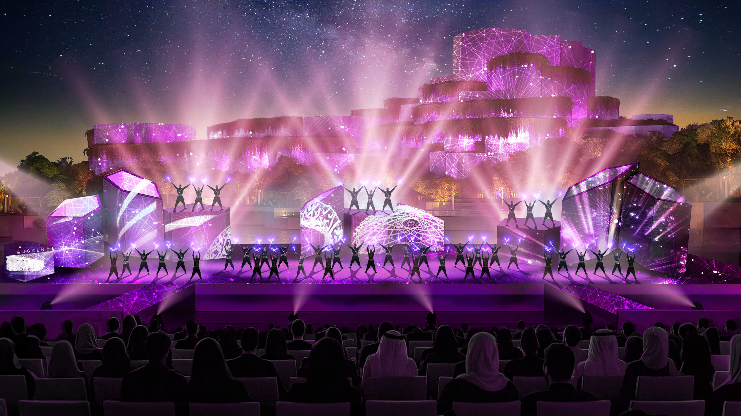 Performance teatrale all'aperto con scena illuminata di luci violette e rosa, con danzatori e attori sotto un cielo notturno stellato.