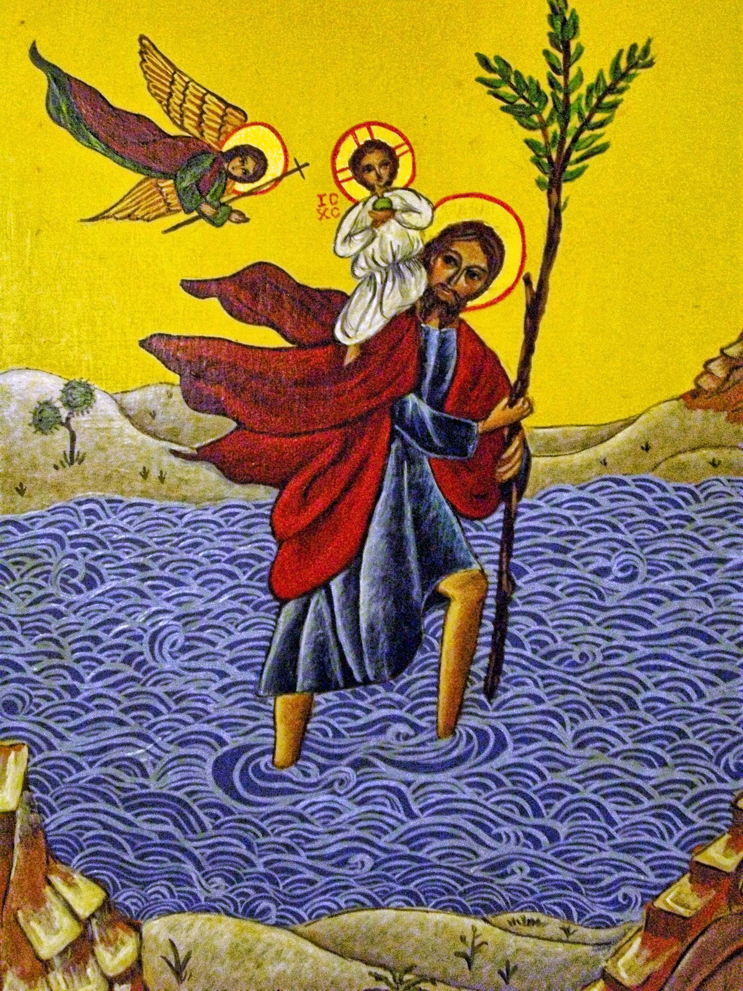 A religious icon painting depicting Jesus Christ holding a staff, with a small figure of a child on his shoulders, against a yellow background with stylized blue waves and rocky landscape.
