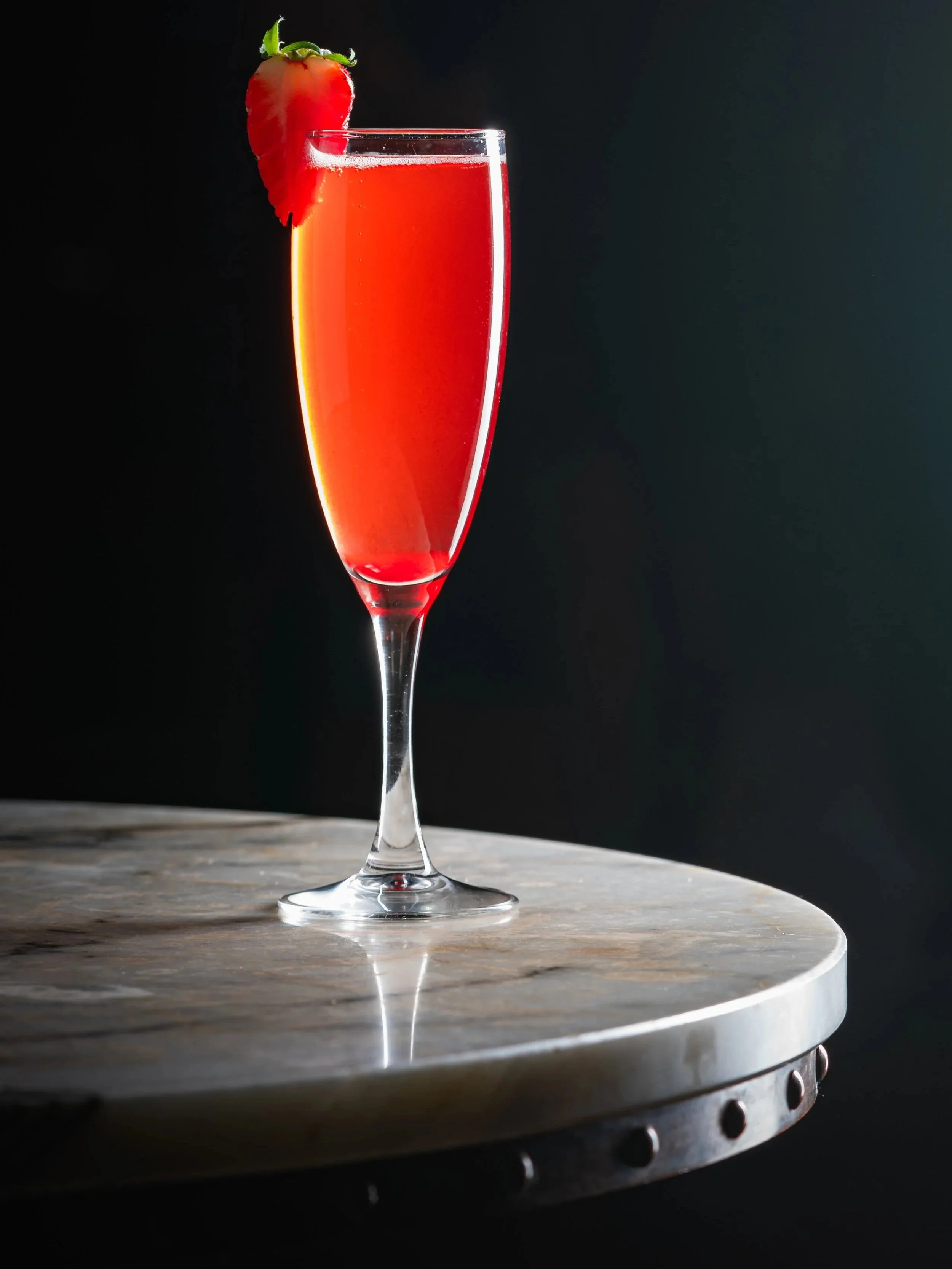 On-location beverage photography for a restaurant in Westport, Mayo, featuring a vibrant red cocktail by Jakub Suliga