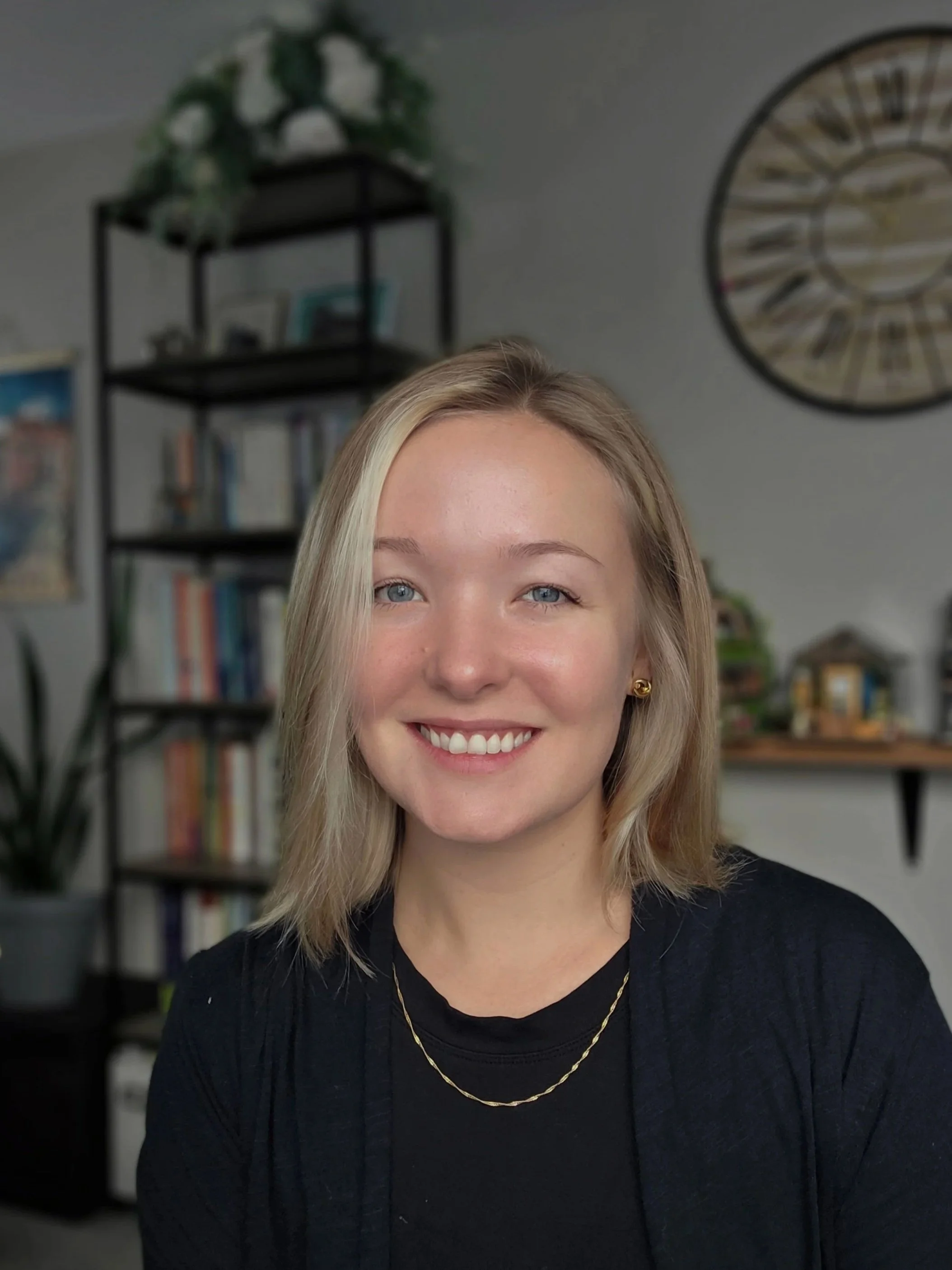 A woman smiling into the camera