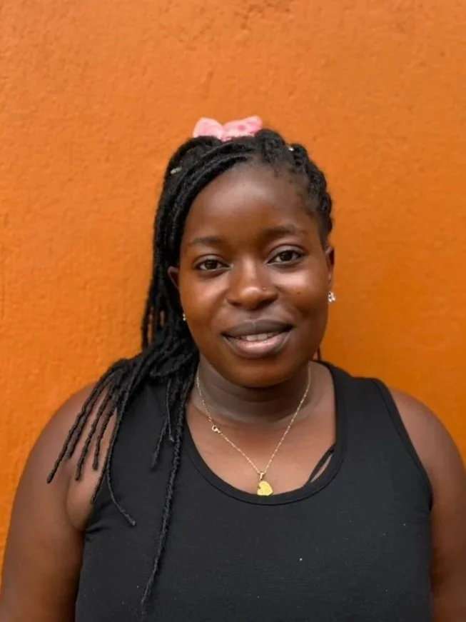 Logo of KigunguKids Educare with two green handprints and text in green on a light green background.