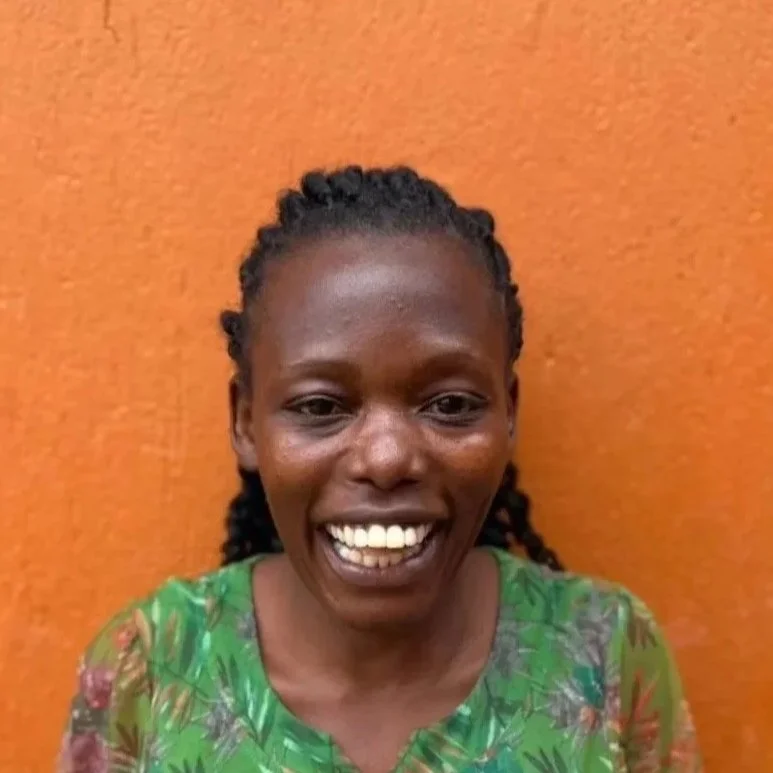 Logo of Kigungu Kids Educare with two green stylized hands and the text 'KigunguKids Educare' on a light green background.