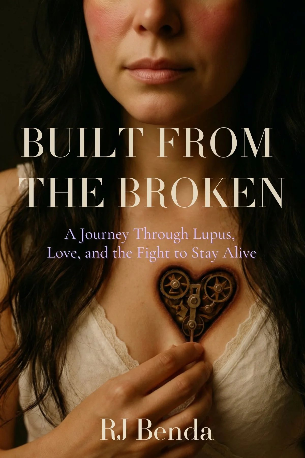 Book cover showing a woman with a mechanical heart, "Built from the Broken".