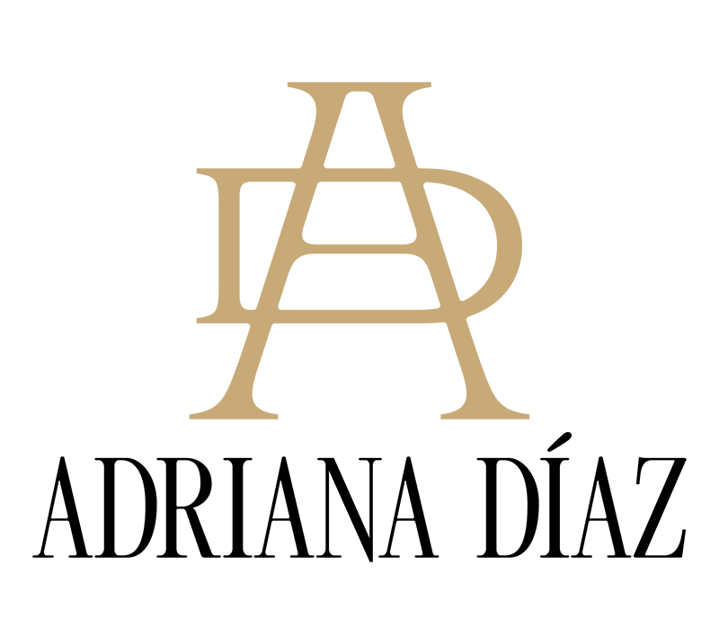 Black background with a gold monogram of the intertwined letters A, A, and D.