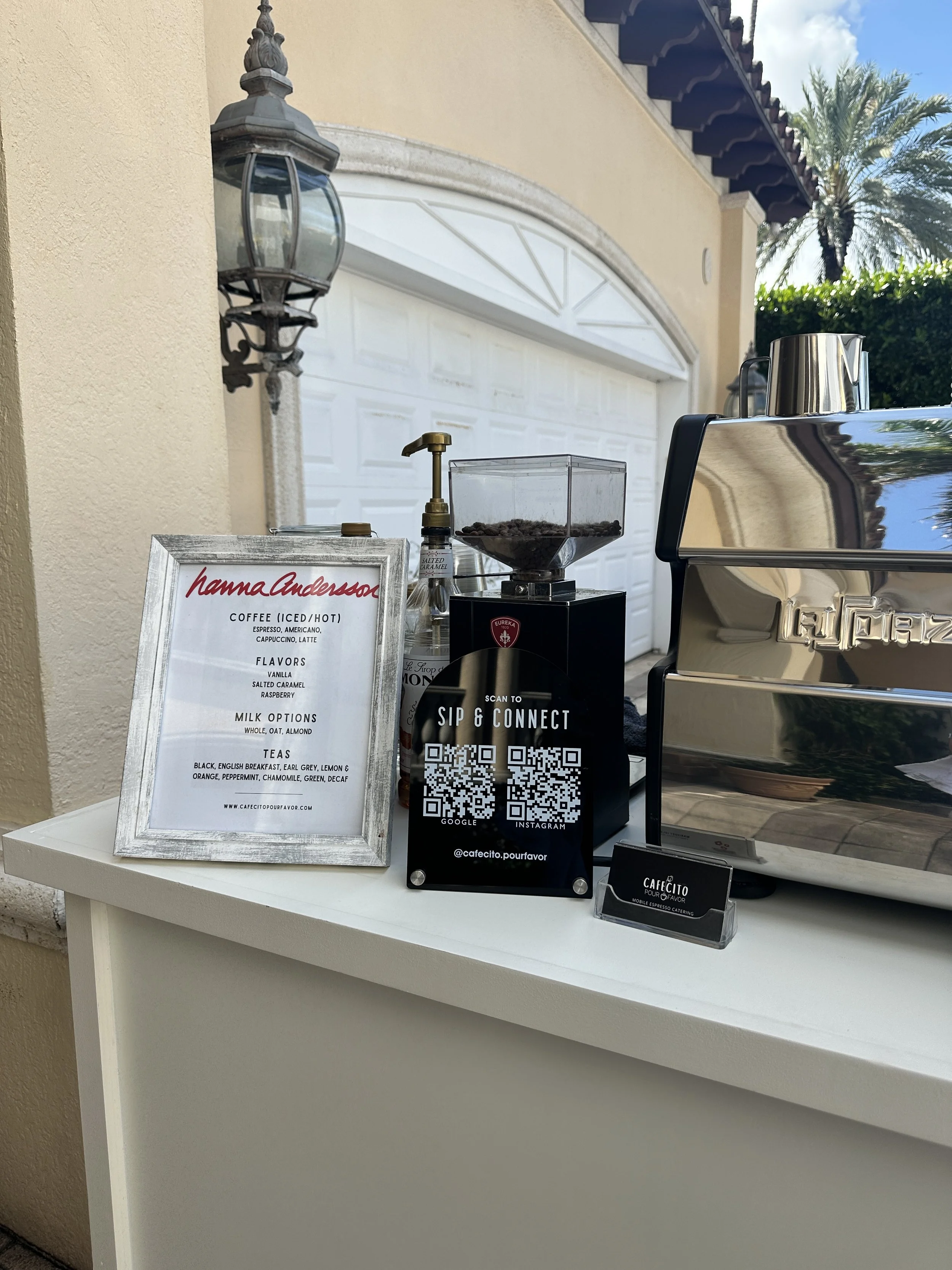 Corporate coffee bar setup in Miami with custom menu, espresso machine, and branded display