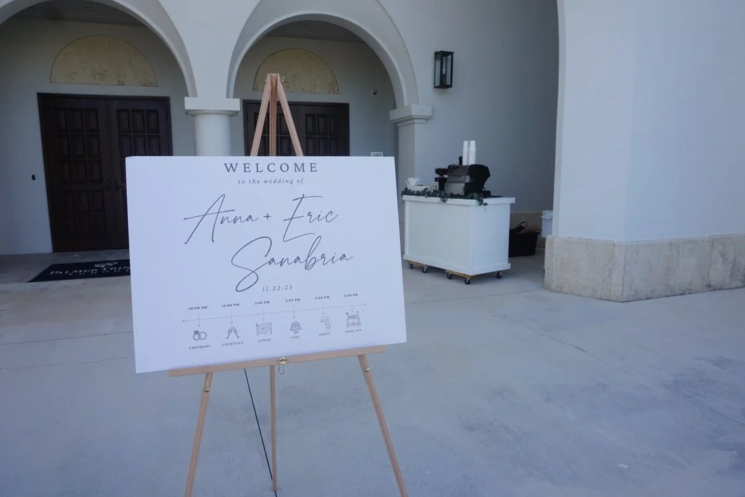 Luxury wedding coffee bar setup in Miami with custom welcome sign and mobile espresso cart