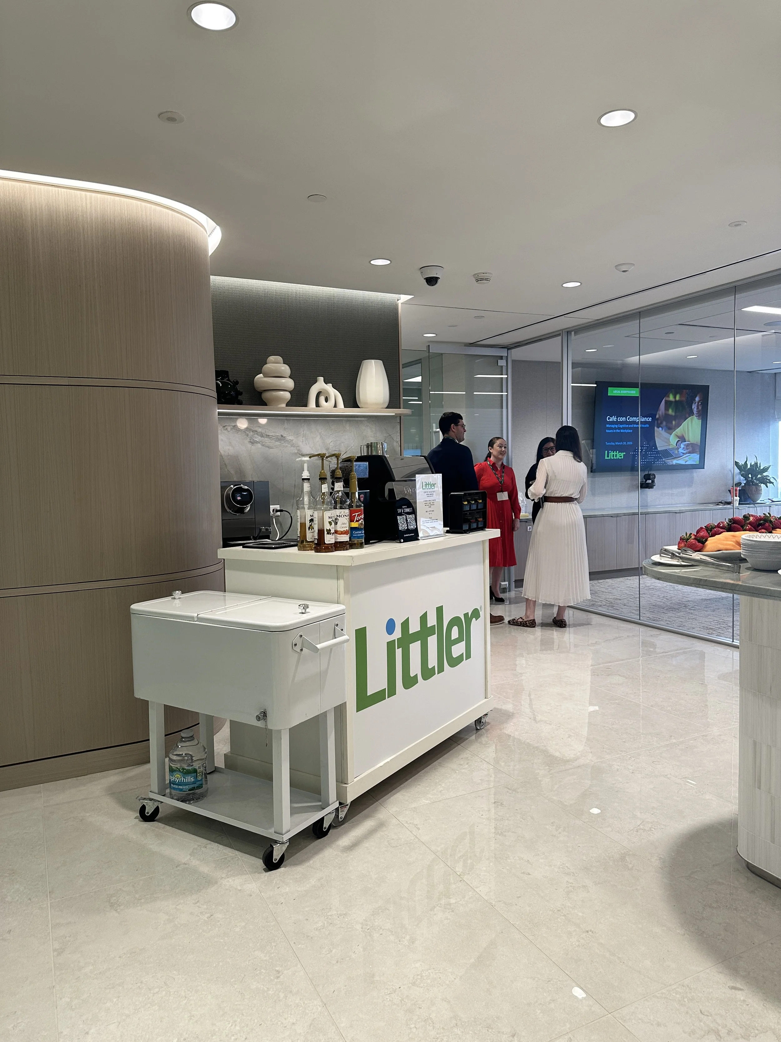 Corporate coffee catering setup in a Miami office with branded coffee cart and espresso station