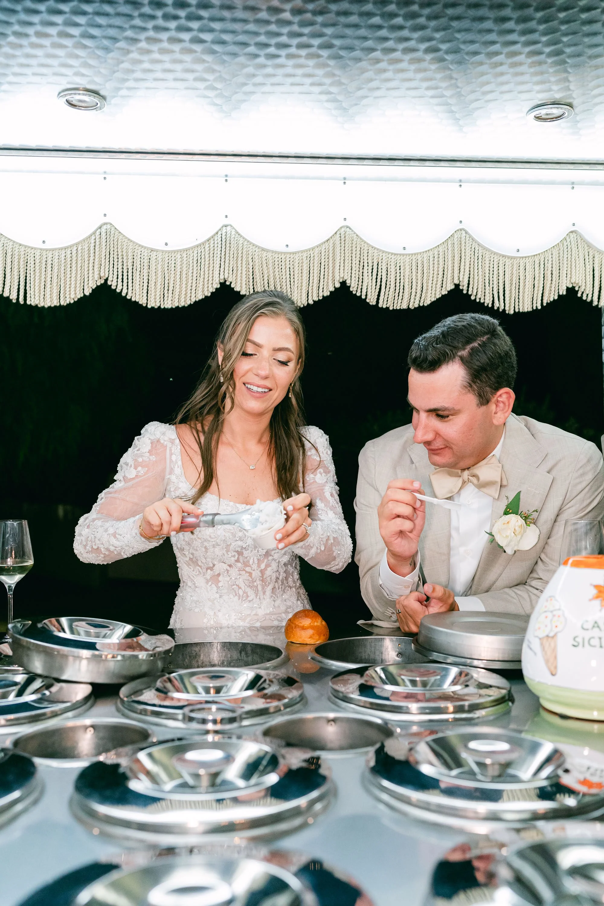 After dinner, the newlyweds scooped their own gelato at the vintage gelato cart at their Sicily Wedding. 