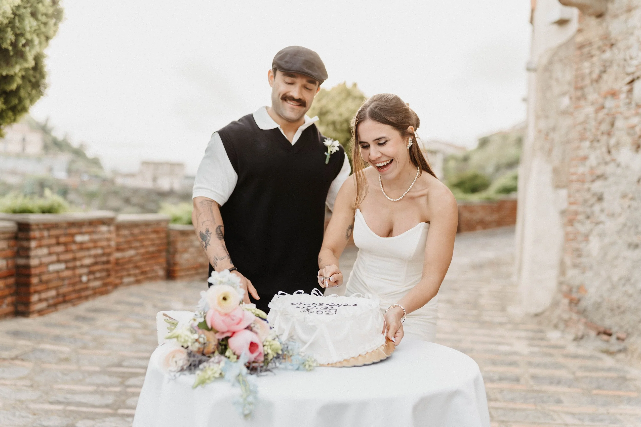 Wedding cake time for Isabela & Luiz at their elopement wedding in Savoca, Sicily. 
