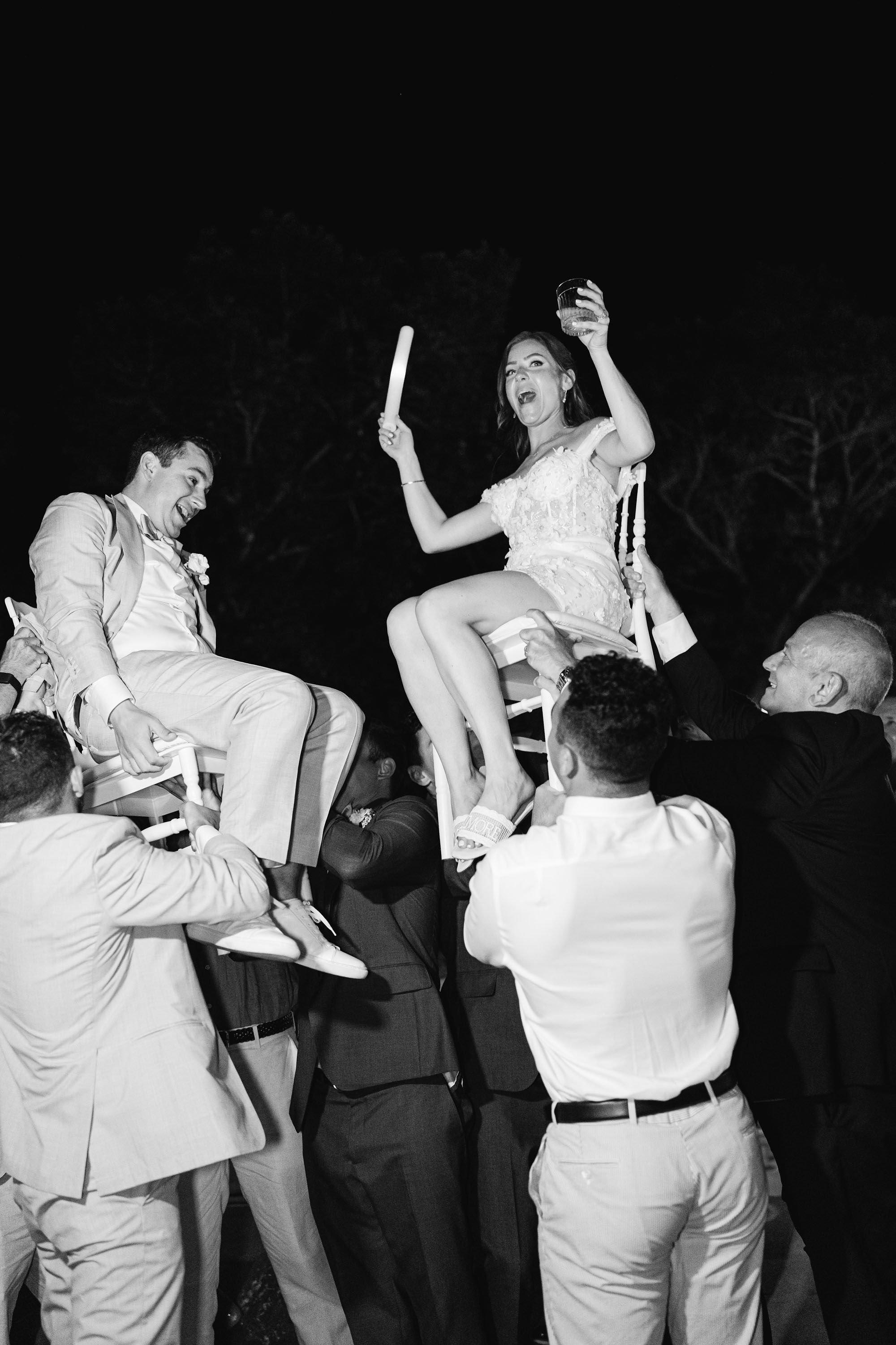 Bride Alexa changed to a party dress for dancing. Wedding in Sicily Taormina.